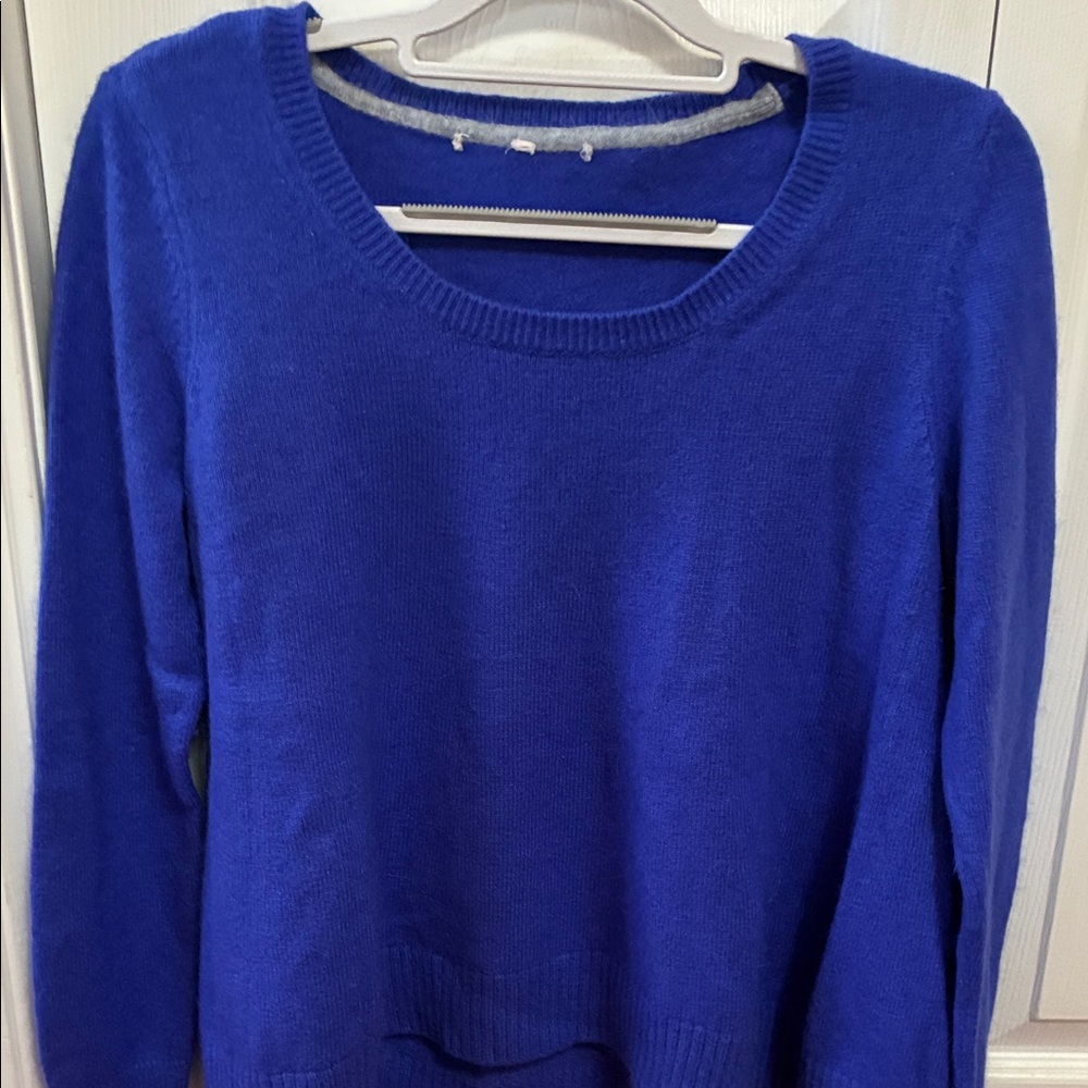 Victoria's Secret Royal Blue Crew Neck Sweater. The hem has a little swing to it